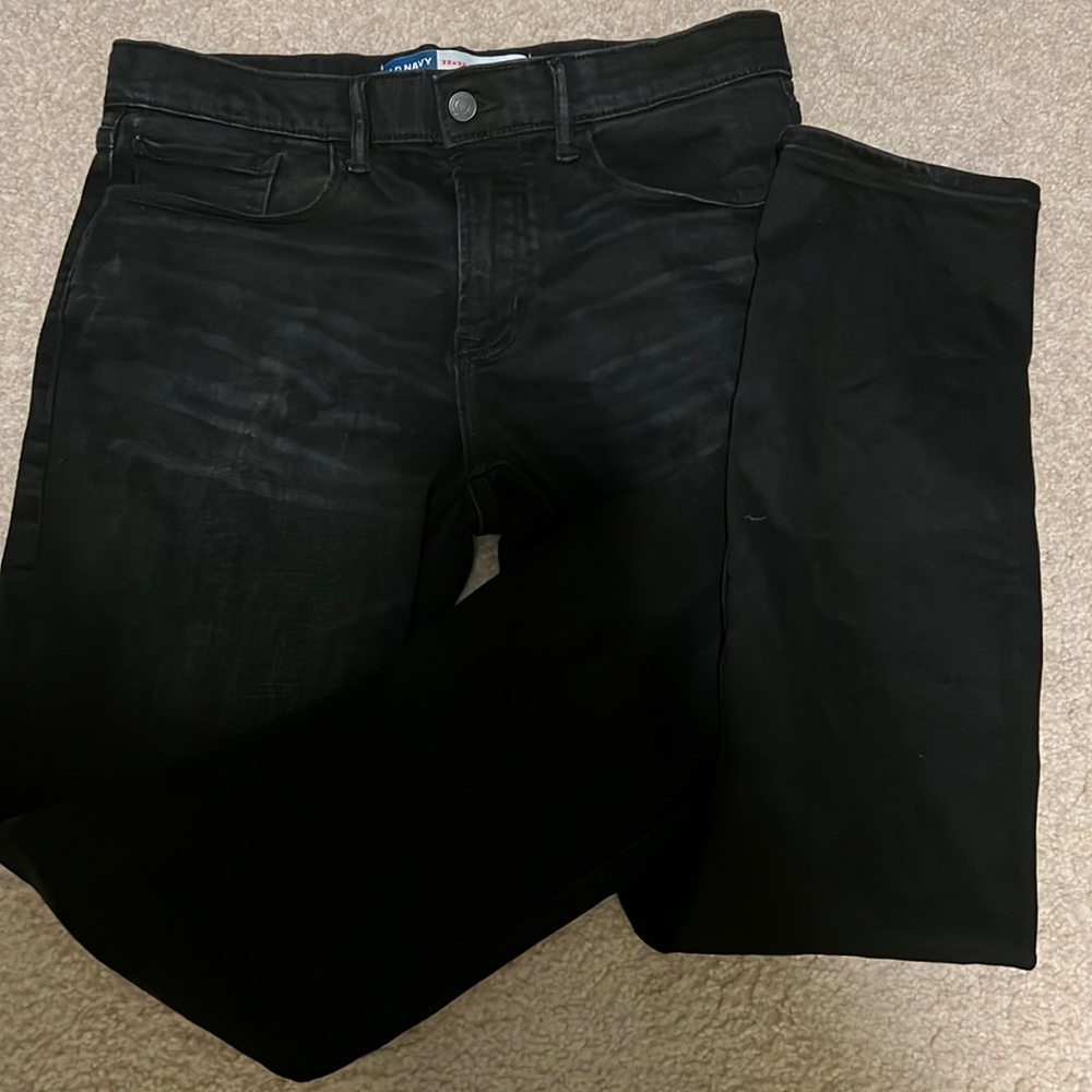 Men’s Slim 360 degree stretch black jeans.